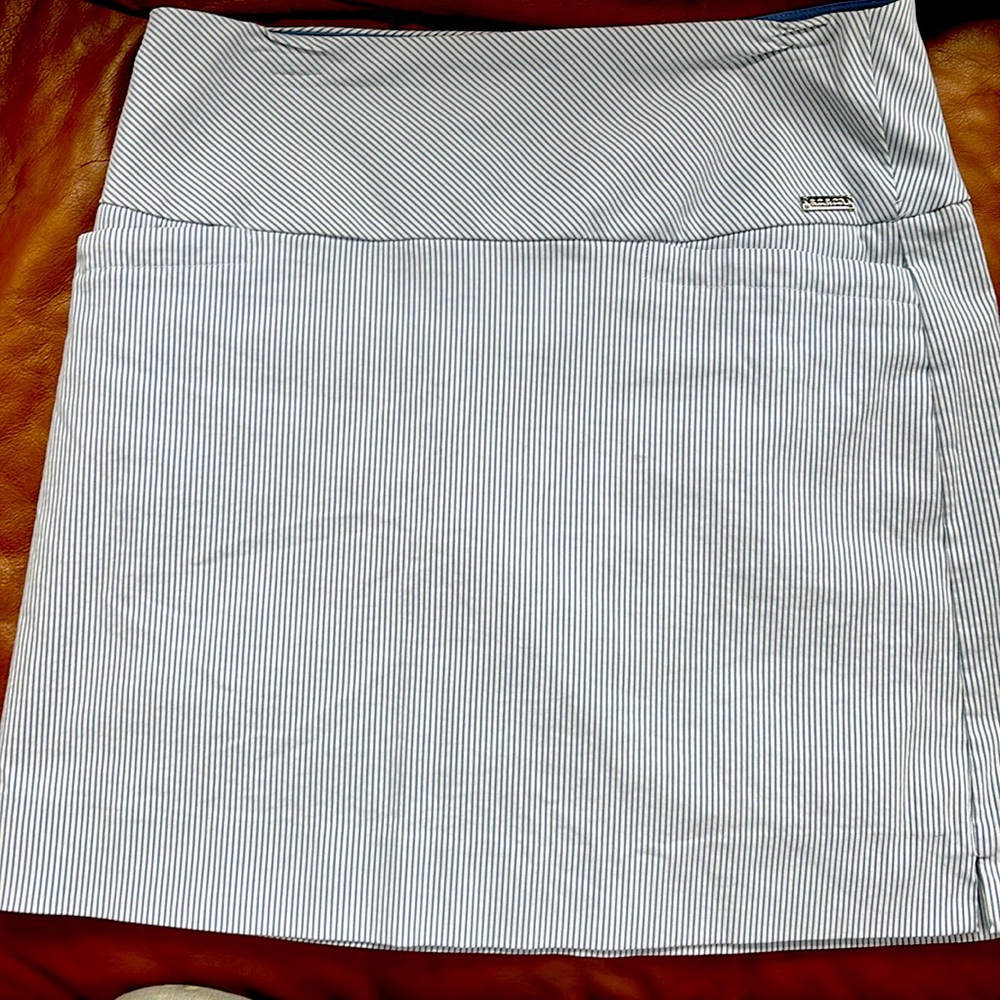 Very good material. Blue and white skort for golf or running around d